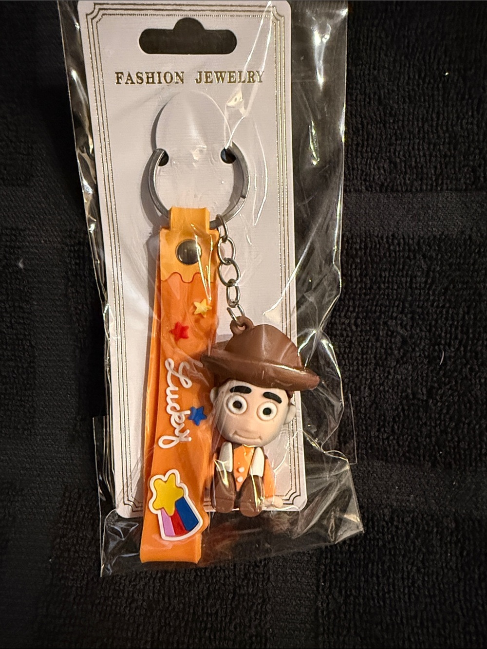 Fashion Jewelry Orange and Brown Cowboy ( Woody ) Keychain Strap